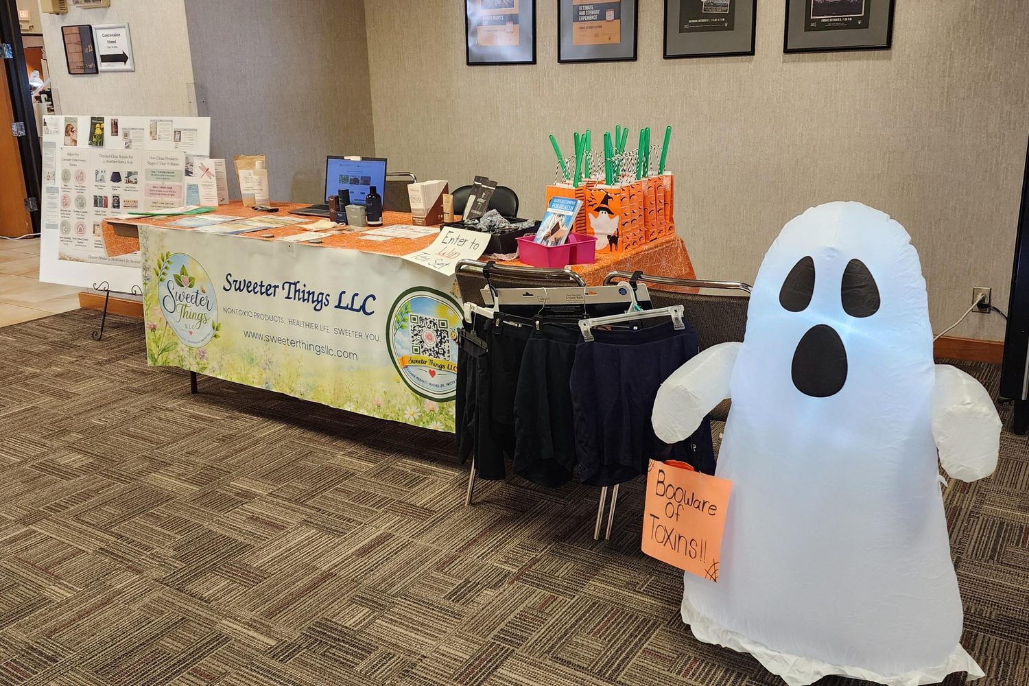 The Sweeter Things LLC booth at the Wellness Expo with an inflatable ghost
